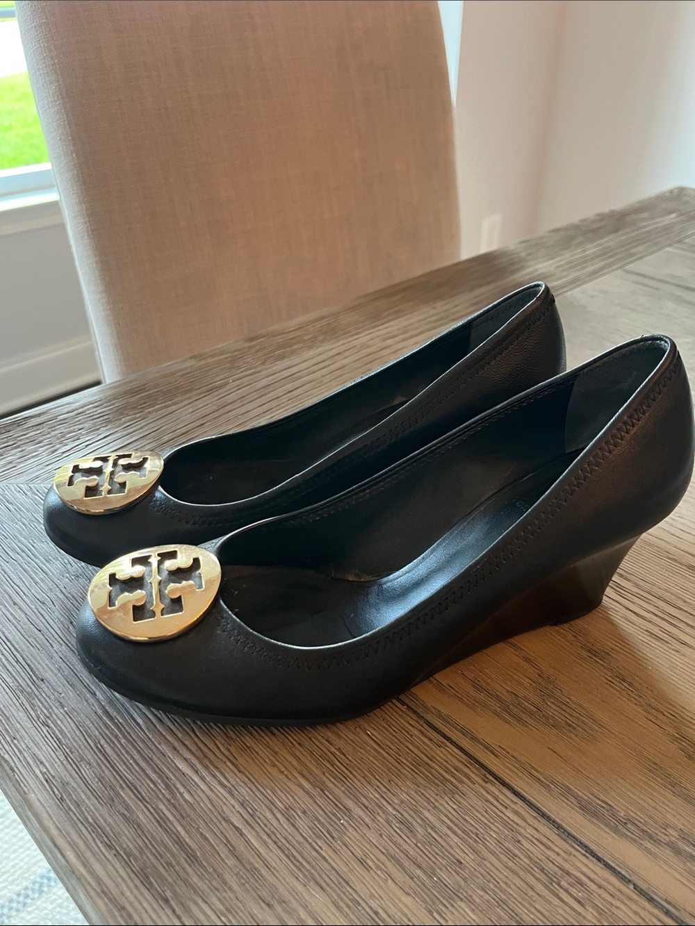 Tory Burch Black Leather Wedges with Gold Logo Medallions